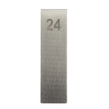 A rectangular, silver metallic sign made of stainless steel stands upright. The number 24 is printed in large, bold, gray digits near the top center. This TableCraft number tent features a brushed texture and a plain white background.