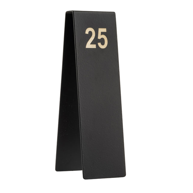 A black, triangular TableCraft Products table number stand with the number 25 in large metallic letters near the top. Made from powder coated stainless steel, this number tent is shown in side profile against a white background, highlighting its sturdy design.