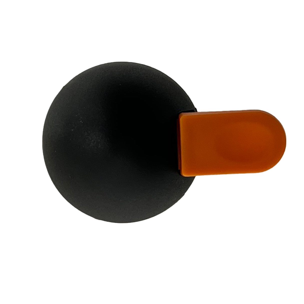 A matte black ABS spherical object with a flat, rectangular orange tab attached to its side, viewed from above against a white background. The orange tab, common on a decaf lid from TableCraft Products, contrasts sharply with the smooth black surface.