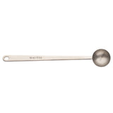 A stainless steel coffee scoop labeled “10 ml / 2 tsp.” features a long handle with a small hole at the end and a round bowl, set against a plain white background.