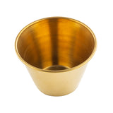 A shiny, gold-colored stainless steel cup with a smooth gold PVD finish and slightly flared rim. The reflective ramekin is photographed on a white background from a high angle, clearly showing its sleek interior.
