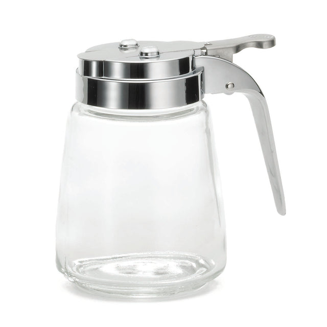 A modern glass dispenser with a wide base and chrome plated lid features a lever handle for easy pouring. The empty dispenser is set against a white background and is dishwasher safe for effortless cleaning.