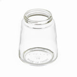 A clear, empty 8 oz. glass jar is shown upside down on a white background. The wide opening and markings—MADE IN CHINA, small raised dots, and B1—are visible through the dishwasher safe glass base.