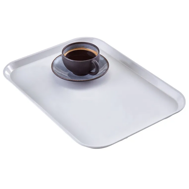 A dark ceramic cup filled with black coffee sits on a matching saucer, placed on a high-impact fiberglass tray with rounded edges, set against a plain white background.