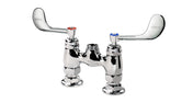 A chrome deck faucet with vandal resistant wrist blade handles shaped like wings, marked red for hot and blue for cold, mounted on a metal base with a central threaded spout opening, against a plain white background.