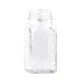A clear, empty glass jar made from durable soda lime glass with a square base and rounded shoulders. The threaded neck fits a screw-on lid. Shown against a plain white background, the jar is perfect for Salt & Pepper Shakers or TableCraft Products collections.