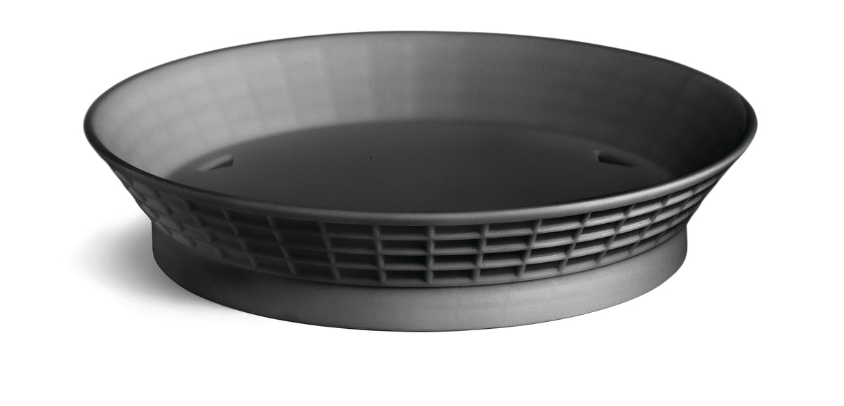 A wide, round, matte black plastic platter basket with a flared, shallow design. Heat resistant and NSF certified, its sides feature a grid-like pattern of square holes while the solid base sits on a white background, casting a soft shadow.