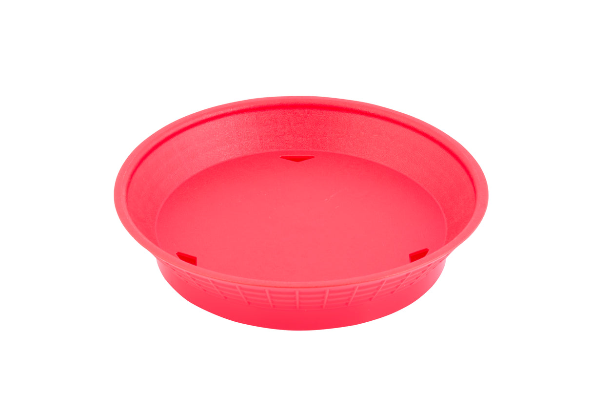 A bright red, round silicone baking cup by TableCraft with a smooth interior and slightly textured exterior sits on a plain white background. The cup has three small triangular indents evenly spaced along the inner side.