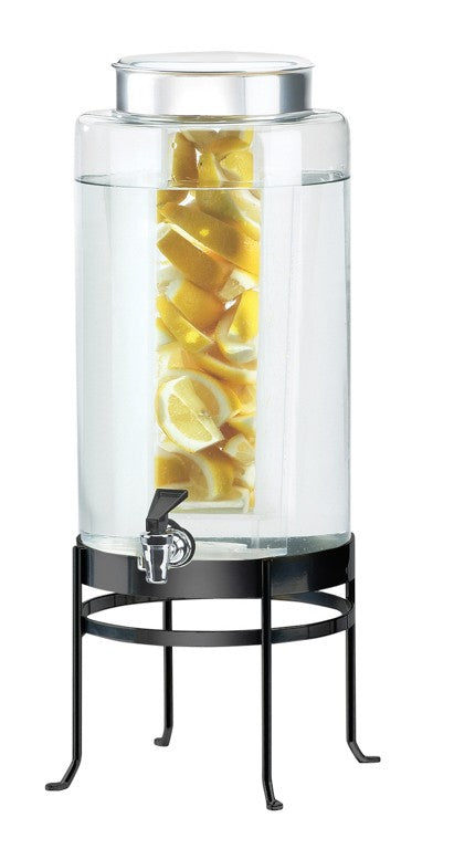 A large BPA Free beverage dispenser filled with water and lemon slices in an infusion chamber, featuring a silver lid, a spigot at the bottom, and sitting on a tall black metal stand.