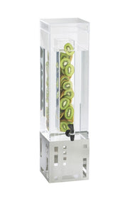 A tall, clear beverage dispenser with a BPA free infusion chamber and a square base features a spigot at the front. Sliced kiwifruit are stacked vertically inside, while the modern silver base displays a striking geometric cut-out pattern.
