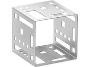 A metallic Cube Riser with geometric cutouts on each surface. Its sleek, stainless steel finish and modern, industrial design stand out against the plain white background.