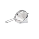 A heavy duty China Cap Strainer with a conical shape, fine mesh, and long handle is positioned on a white background. The stainless steel strainer is angled to display both the mesh basket and the handle.