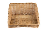 A handwoven rectangular basket tray with low sides and an open front, featuring a woven pattern. The empty willow basket sits against a white background, highlighting its natural brown color and wicker texture.