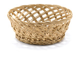 A round, empty, light-brown handwoven basket with an open weave pattern sits on a white surface. The basket features intertwined, crisscrossed strands and a slightly flared rim, creating a textured, airy appearance.