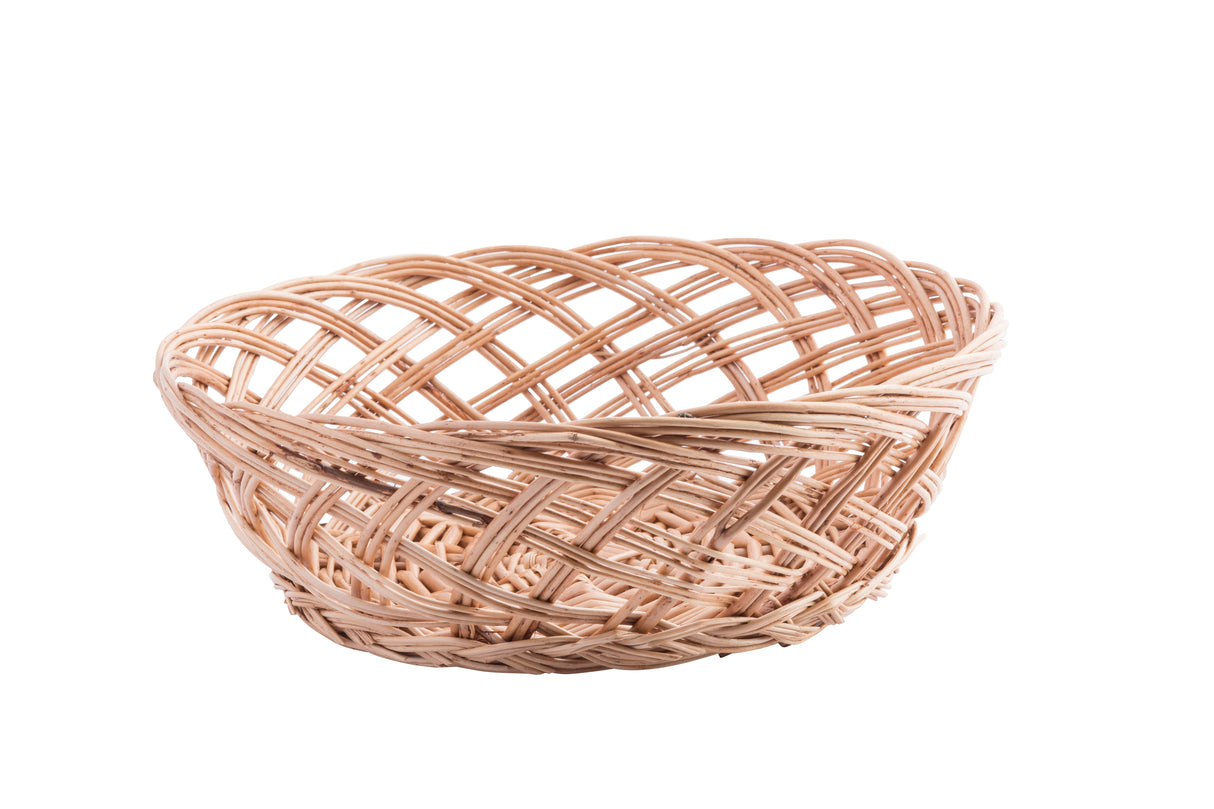A round, shallow handwoven basket with an open lattice pattern, made from light-colored natural materials, sits on a white background. The round basket appears empty and has a slightly flared rim.