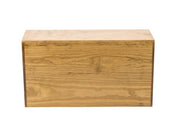 A rectangular wooden block with visible grain patterns and a smooth, light brown finish, this rustic pine display riser is photographed against a plain white background, showcasing the natural texture of the wood.