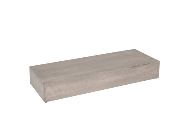 A rectangular Aspen Riser crafted from gray-washed pine wood sits on a white background. The block has smooth surfaces and sharp edges, appearing solid and unfinished with a minimalist design.
