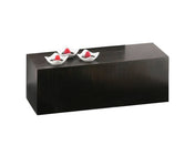 A rectangular, dark wooden coffee table with a smooth surface, styled like a bamboo crate. On top, three small, white, leaf-shaped bowls each hold a red decorative object. The background is plain white.