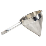 A heavy duty China Cap Strainer with a stainless steel fine mesh body and solid handle is shown against a white background. Its metal frame and pointed tip make it ideal for precise filtering in kitchen tasks.