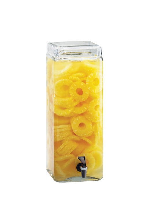 A clear, tall, rectangular BPA Free infusion dispenser filled with yellow pineapple rings in liquid. This 3 gallon glass beverage dispenser features a silver spigot and matching square lid, set against a plain white background.