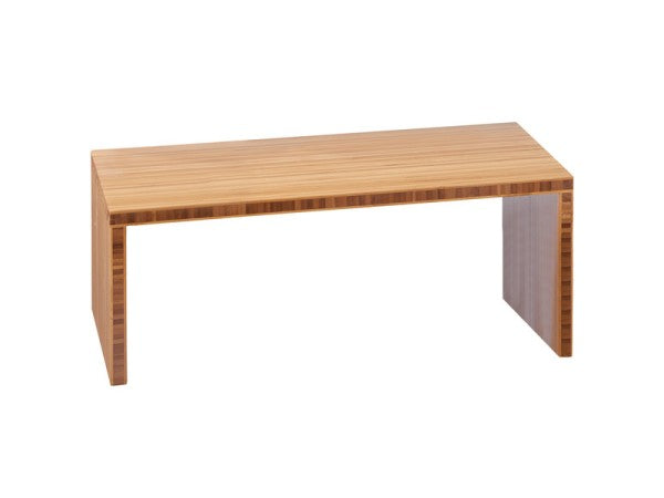 A simple rectangular wooden bench with a smooth, flat surface and thick, straight legs at each end. The bench features a natural bamboo wood grain finish and no visible decorations or cushions. It is photographed against a plain white background.