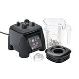 A commercial Xtreme Series Blender with a black base featuring control buttons, a transparent graduated pitcher, a clear lid insert, and a black square lid with central opening, all displayed on a white background. Ideal for international use.
