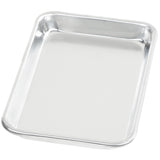A rectangular, shallow 1/8 size sheet pan made of heavy duty aluminum with rounded corners and slightly raised edges, shown on a white background. The tray appears clean and empty, with a smooth, reflective surface.