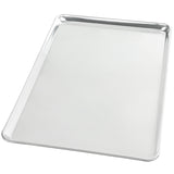 A large, empty full size rectangular sheet pan with raised edges, shown from a slight angle on a white background. Made of solid aluminum, the pan appears clean and shiny, reflecting light on its smooth surface.
