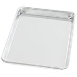 A shiny, rectangular aluminum bun sheet pan with raised edges on all sides is shown on a white background. The 1/4 size pan features smooth surfaces and slightly rounded corners, ideal for baking or roasting food in an oven.
