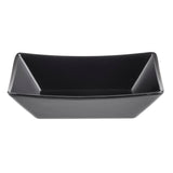 A rectangular, black ceramic bowl with angled sides and a glossy finish, photographed on a white background. Reminiscent of a Better Burger Fry Tray, it is empty and viewed from above, emphasizing its geometric shape and smooth surface.