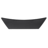A sleek, rectangular black melamine plate with upturned edges, viewed from the side against a white background. The minimalist fry tray design creates a gentle curve, giving it a modern, elegant, and dishwasher safe appearance.