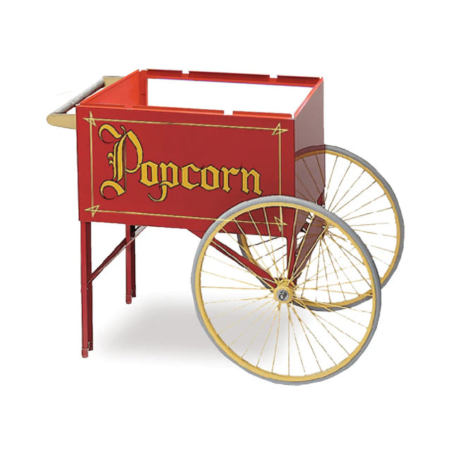 A vintage-style Gold Medal Products popcorn cart with a bold red exterior, large gold-rimmed wheels, ornate yellow "Popcorn" lettering, an open top, and a small handle at the back—perfect for classic snacking charm.