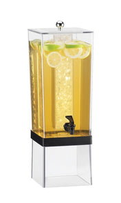 A clear 3-gallon beverage dispenser filled with yellow lemonade, lemon slices, and mint. It features a central ice chamber to keep drinks cold, a black spigot on the front, and stands on a transparent base.