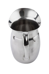 A shiny stainless steel pitcher with a wide mouth, rounded body, and sturdy handle. Its reflective surface gleams on a white background, while the smooth, curved lip of this dishwasher safe pitcher ensures effortless pouring.