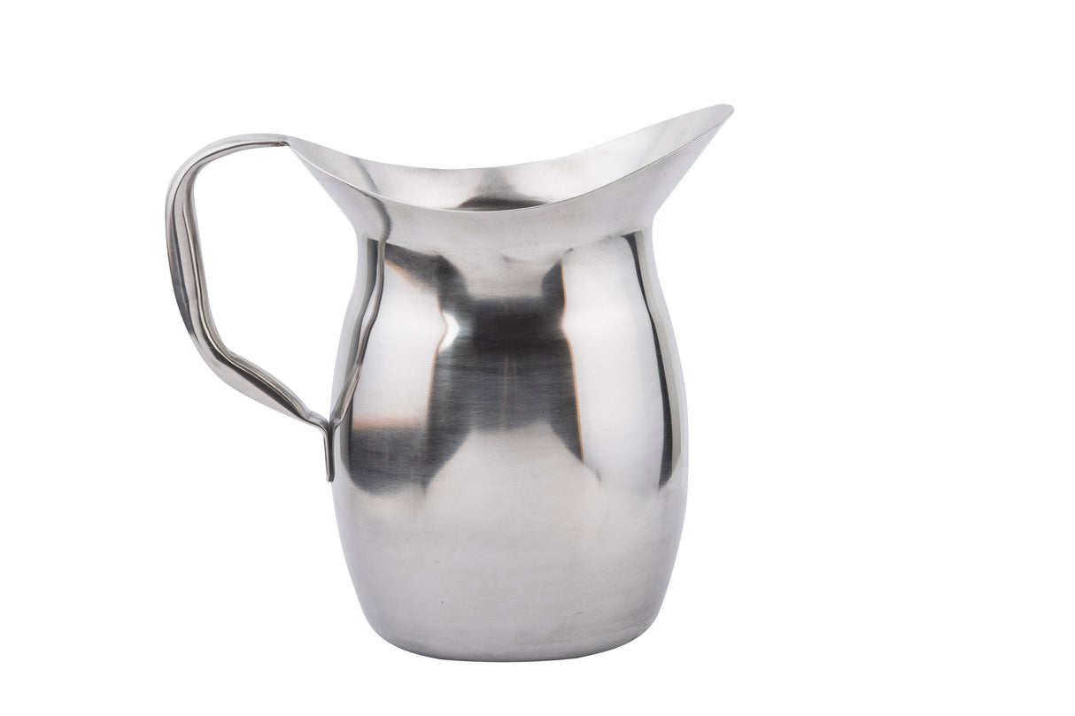 The Bell Water Pitcher is a shiny, stainless steel pitcher with a curved, flared spout and a wide, sturdy handle. Its reflective surface stands out against a plain white background and is conveniently dishwasher safe.