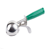 A stainless steel disher with a shiny, round scooping bowl and a green plastic handle. It features a mechanical lever for easy release of ice cream, visible on the underside of the handle, set against a plain white background.