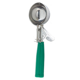 A stainless steel ice cream scoop with a shiny, round bowl and spring-loaded mechanism. The green, textured handle ensures a secure grip. The scoop is shown vertically, bowl facing up, against a plain white background.