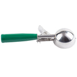 A TableCraft stainless steel ice cream scoop with a green plastic handle features a trigger mechanism for easy release. Photographed horizontally against a white background, it pairs well with other TableCraft essentials like their napkin dispenser.
