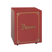 A red, box-shaped Popcorn Machine Cabinet with gold decorative trim and "Popcorn" in ornate gold lettering on the front. Inspired by the Antique Citation Popcorn Machine from Gold Medal Products, it features vintage gold fan corner designs on a white background.