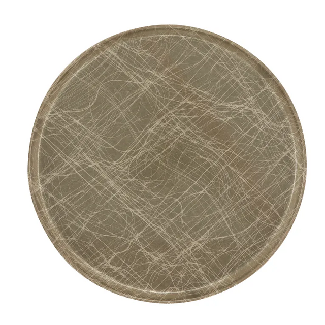 A round fiberglass tray in muted beige tones, featuring a pattern of intersecting, thin, white and light tan curved lines that resemble scratches or scribbles. This NSF Serving Camtray has a slight raised edge and a smooth, matte finish.