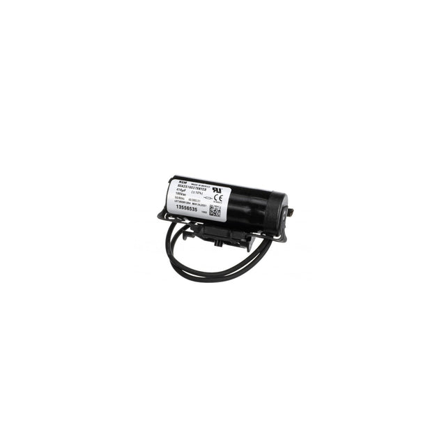 A compact black electric motor with a white label displaying text and certification symbols, such as Capac Start, is attached to a mounting bracket. Two black wires extend from the side. The motor is isolated on a white background.