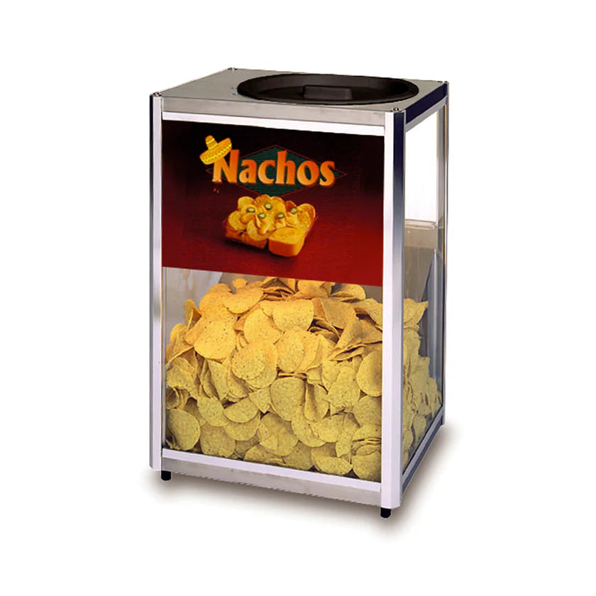 A Gold Medal Products Servalot chip warmer made of metal and glass, filled with yellow tortilla chips. The top has a black circular lid, and the front displays a vibrant "Nachos" sign with images of cheese and jalapeños.