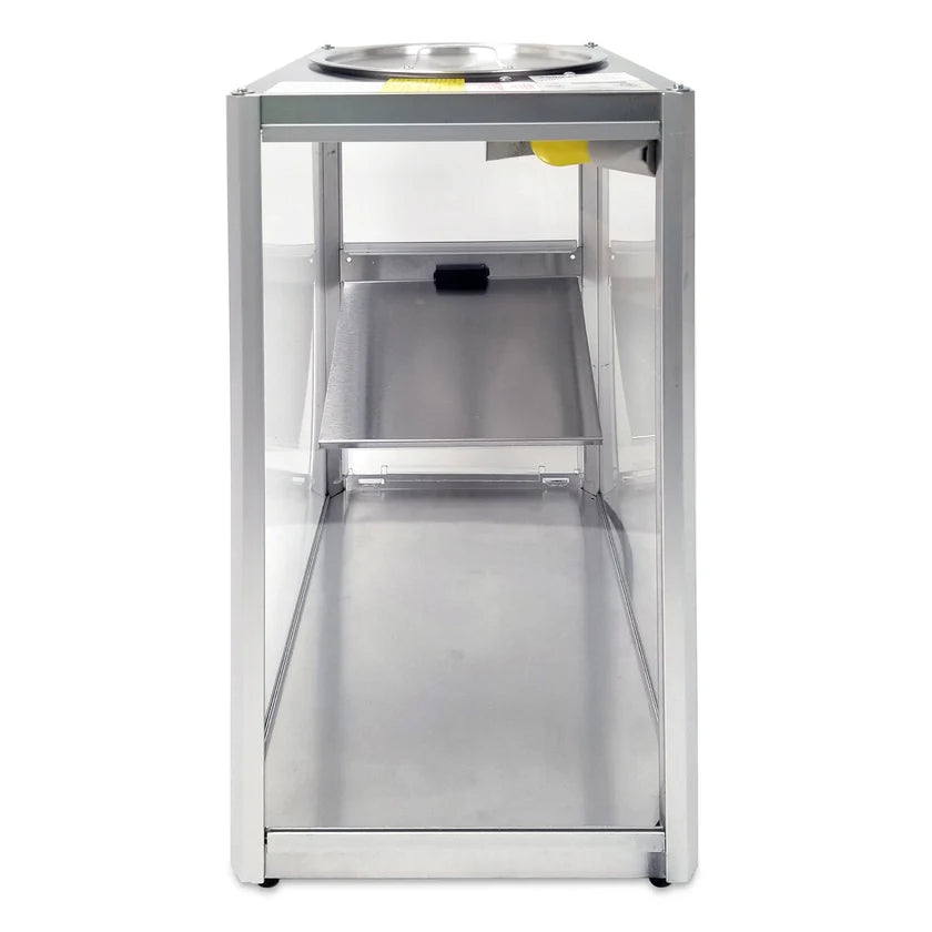 A tall, rectangular metal enclosure with clear sides and a flat metal base viewed from the end. Inside, a slanted metal shelf and round bowl suggest this is a Servalot chip warmer by Gold Medal Products, designed for efficient snack dispensing.