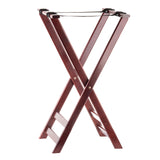 A dark wood tray stand with a rich mahogany finish, featuring crossed legs and slip-proof black nylon straps on top for holding suitcases. The rack is standing open on a white background.
