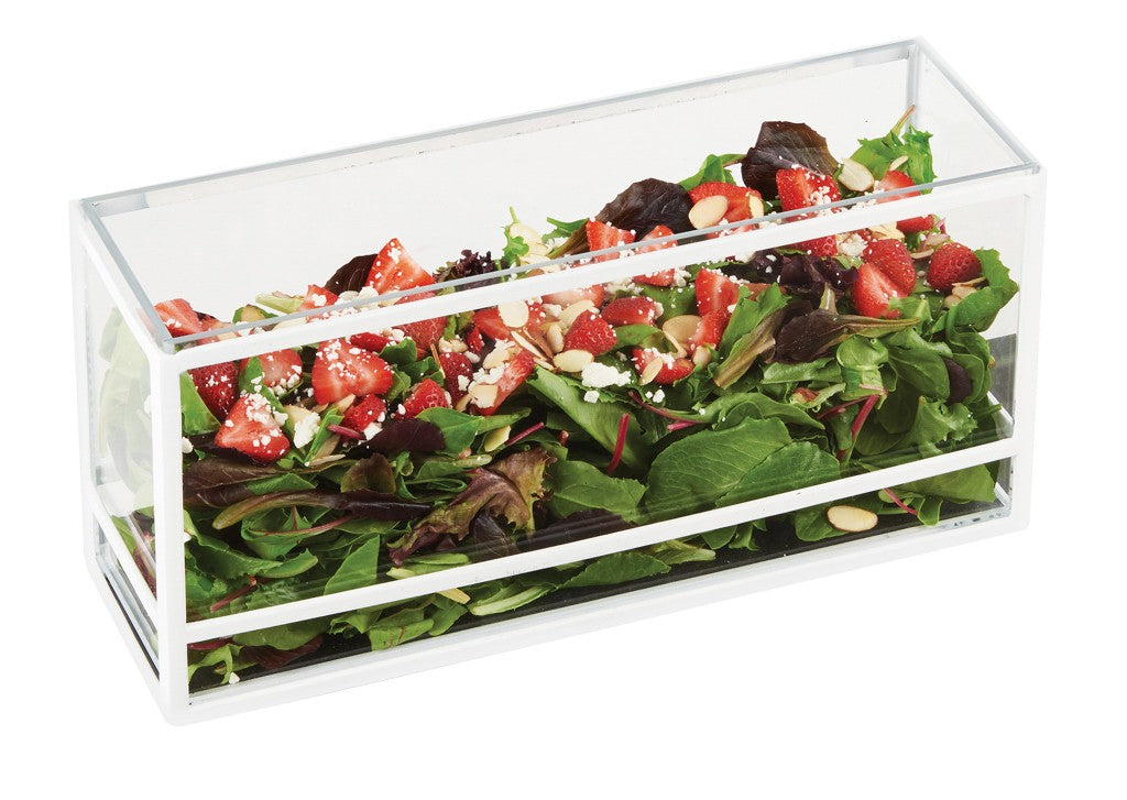 A clear Cal-Mil rectangular box filled with fresh mixed green salad, topped with sliced strawberries, crumbled cheese, and sliced almonds creates a vibrant presentation display against a white background.