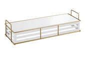 A modern rectangular white organizer tray with a gold wire frame, side handles, and two horizontal slits on each side. Three front compartments and minimalist gold accents evoke an Empire-inspired elegance for stylish organization.