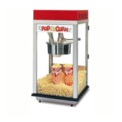 A countertop popcorn machine with a red top and glass sides is filled with freshly popped popcorn. Inside, three red and white striped Pop Corn containers sit among the popcorn on the heated corn deck at the bottom.