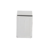 A shiny, rectangular TableCraft napkin dispenser is shown against a plain white background. Made of stainless steel, it features a smooth surface with a front slot for dispensing napkins and a lid on top. The design is simple and utilitarian.