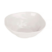A small, ivory bowl with an irregular, organic shape and gently curved edges, photographed against a plain white background. The bowl has a glossy finish and a minimalist, modern design.