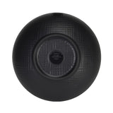 A black serving bowl, round and ceramic, viewed from above. The surface features a subtle crisscross texture, with a circular, slightly raised base at the center. Faint text inside the base indicates manufacturing details.